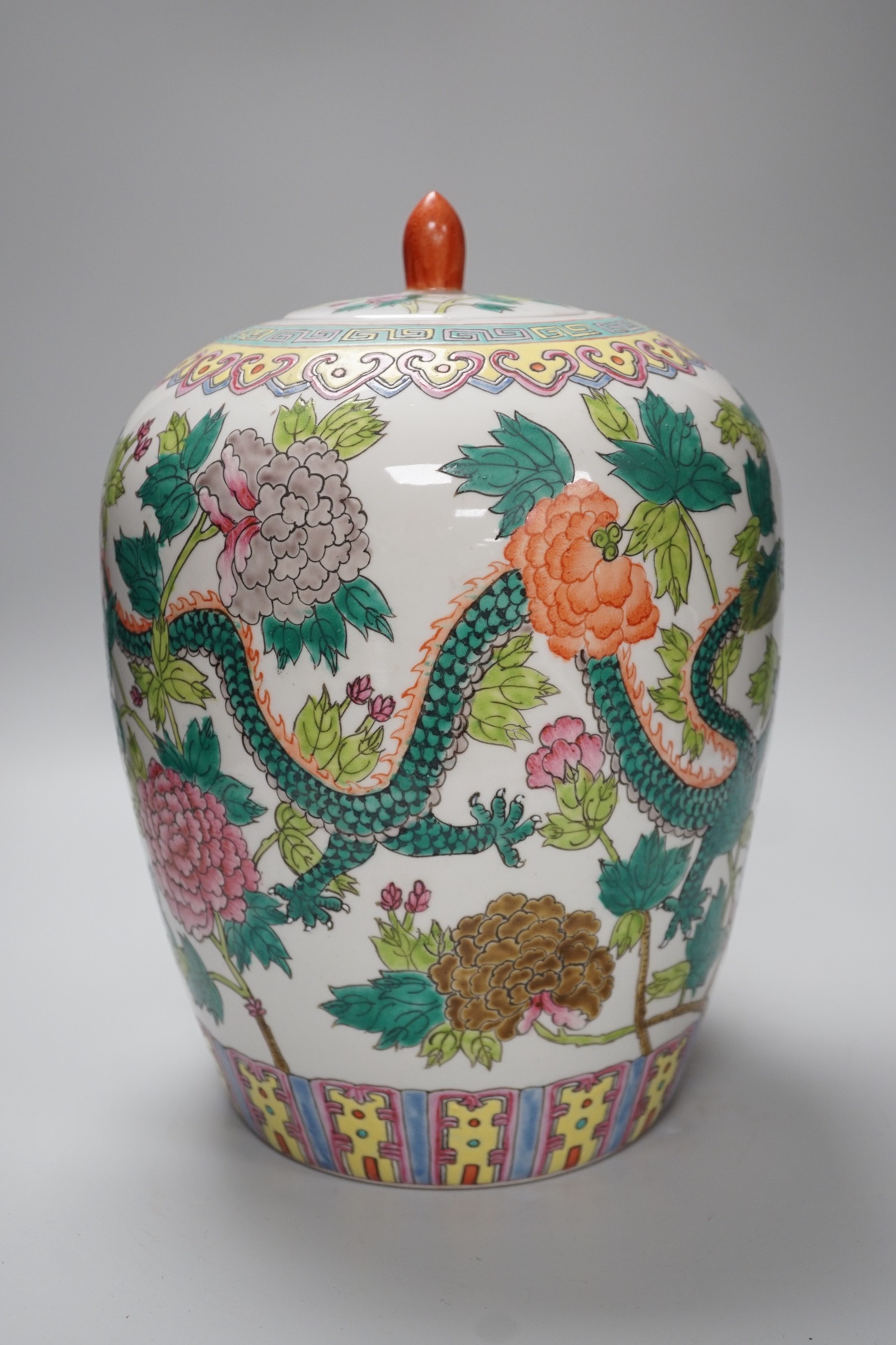 A Chinese famille rose ’dragon’ jar and cover, approximately 30cms high